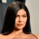 A photo of Kylie Jenner at the Vanity Fair Oscar Party in 2020 looking at the camera.